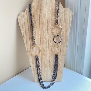 Daisy Fuentes long two tone multi chain necklace in black and goldtone metal